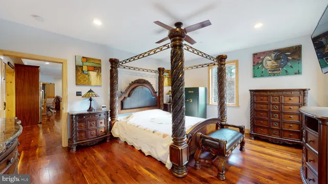 a bathroom with a sink a mirror and a shower