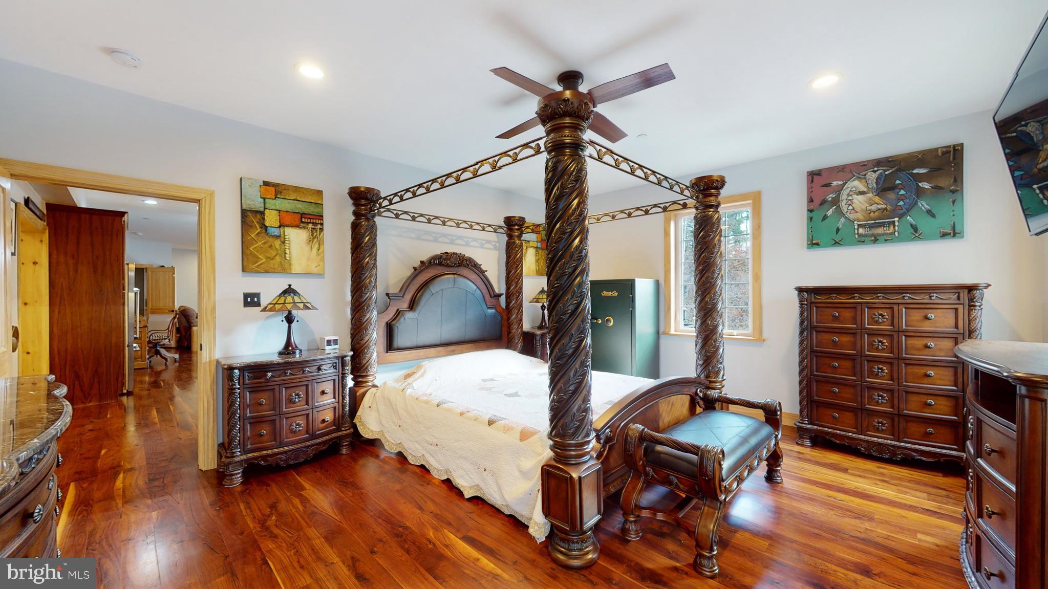 901 Crum Creek Road Springfield, PA 19064 - Photo 17 of 116 a bedroom with furniture and a wooden floor