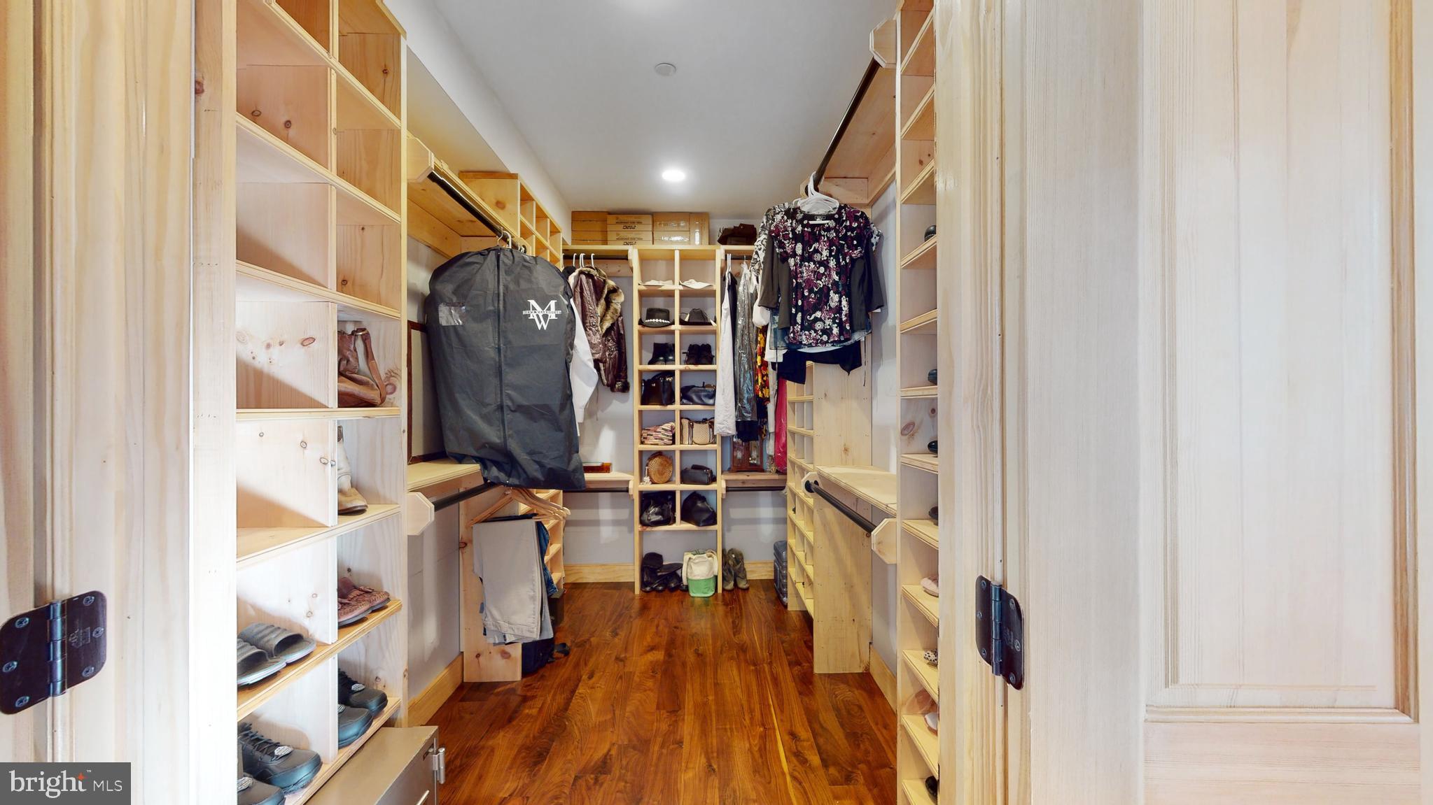 901 Crum Creek Road Springfield, PA 19064 - Photo 22 of 116 a view of walk in closet with clothes and shoes