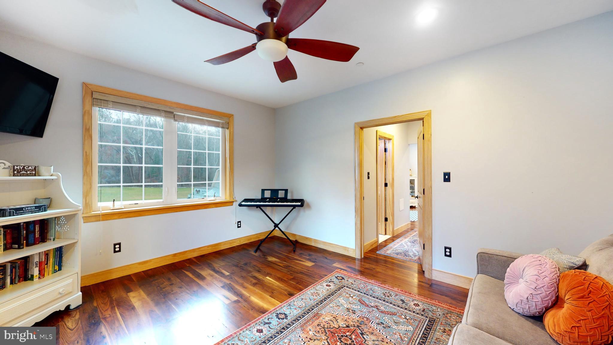 901 Crum Creek Road Springfield, PA 19064 - Photo 23 of 116 a living room with furniture and a flat screen tv