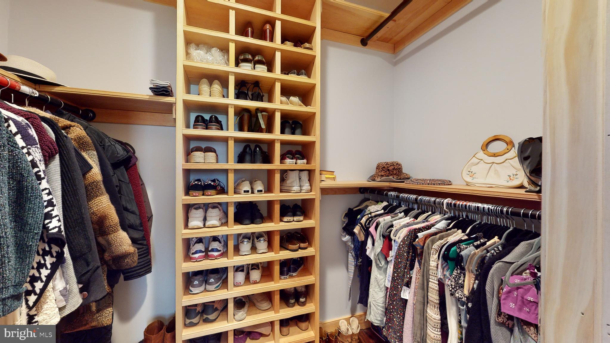 901 Crum Creek Road Springfield, PA 19064 - Photo 27 of 116 a view of walk in closet with clothes and shoes