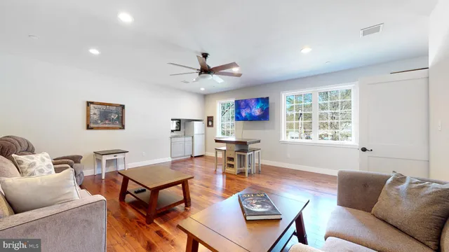 a front view of a house with swimming pool