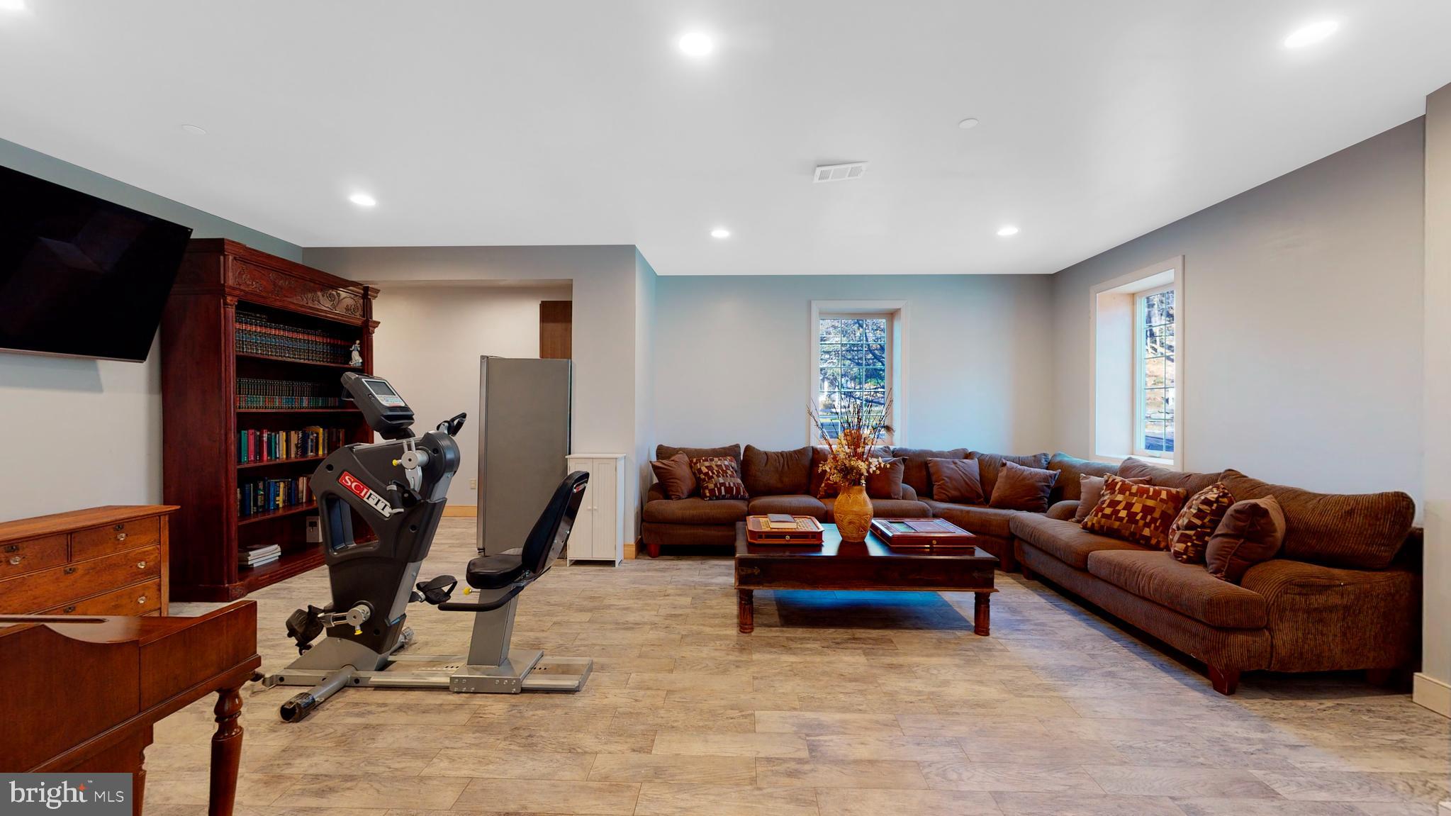 901 Crum Creek Road Springfield, PA 19064 - Photo 71 of 116 a living room with furniture and a flat screen tv