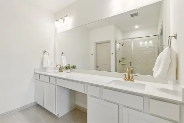 a bathroom with a sink a toilet and bathtub