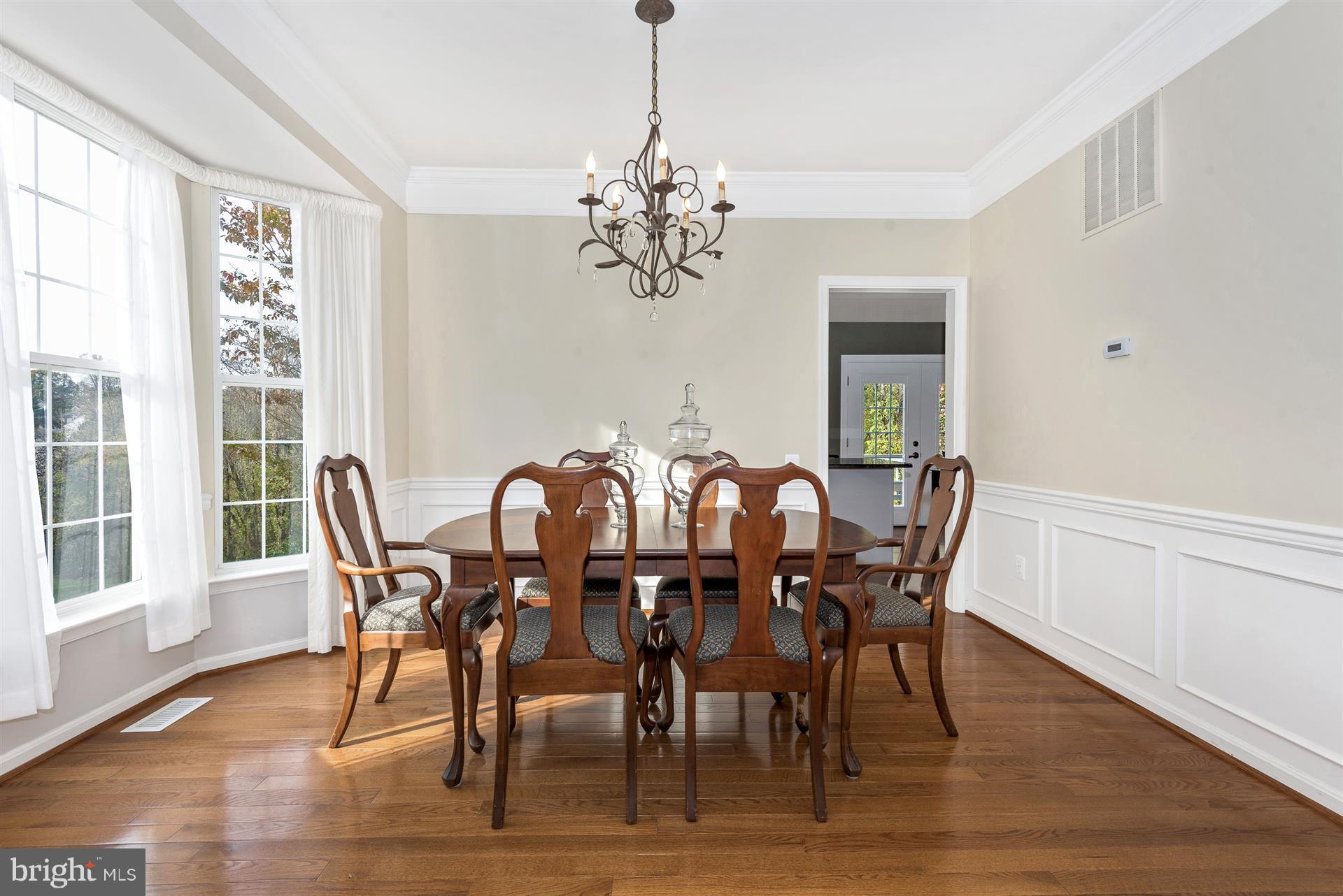 11247 Country Club Road New Market, MD 21774 - Photo 6 of 30 Beautiful chandelier and wainscoating