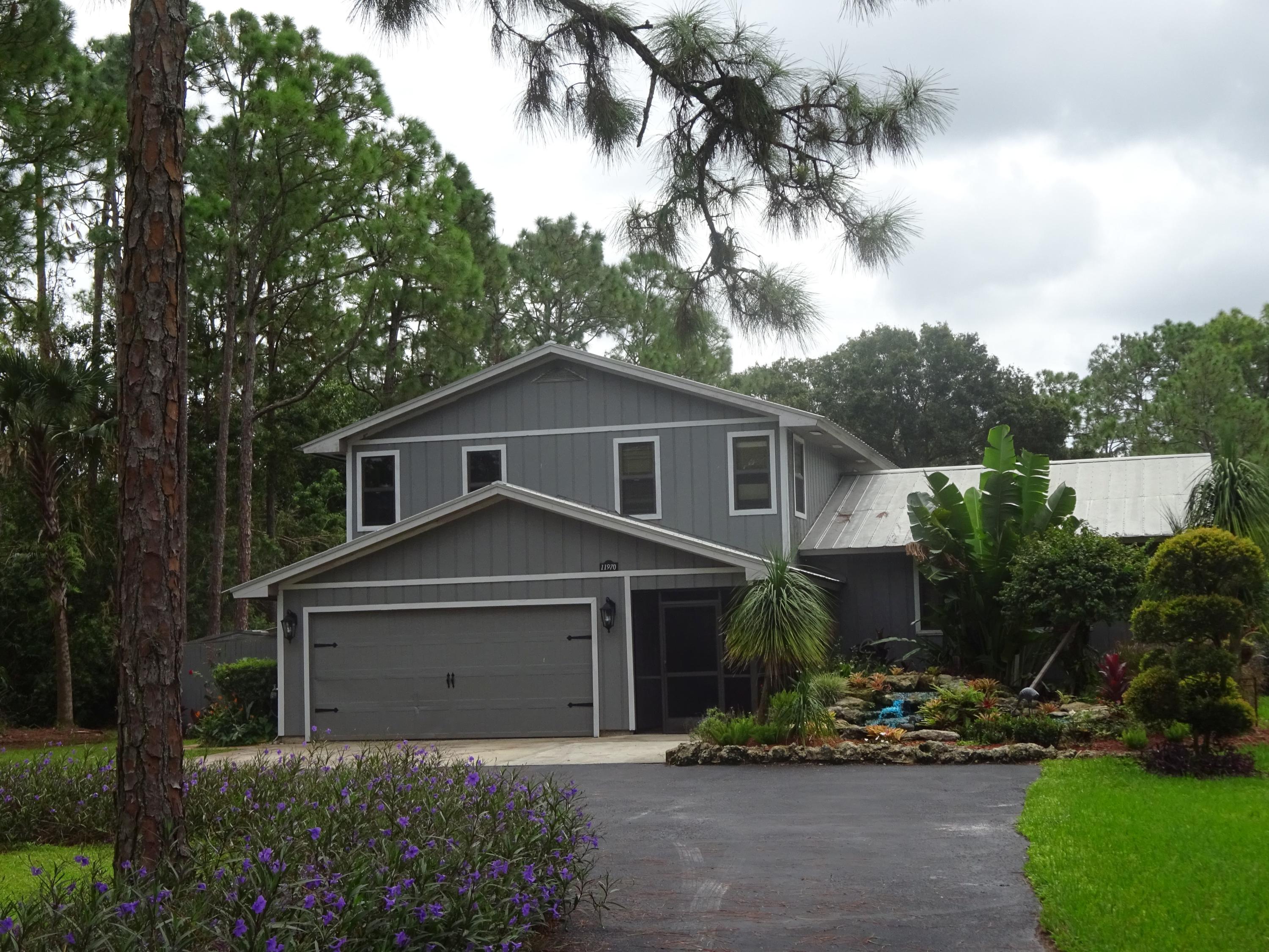 11970 175th Road North Jupiter, FL 33478 - Photo 2 of 28 Front facade