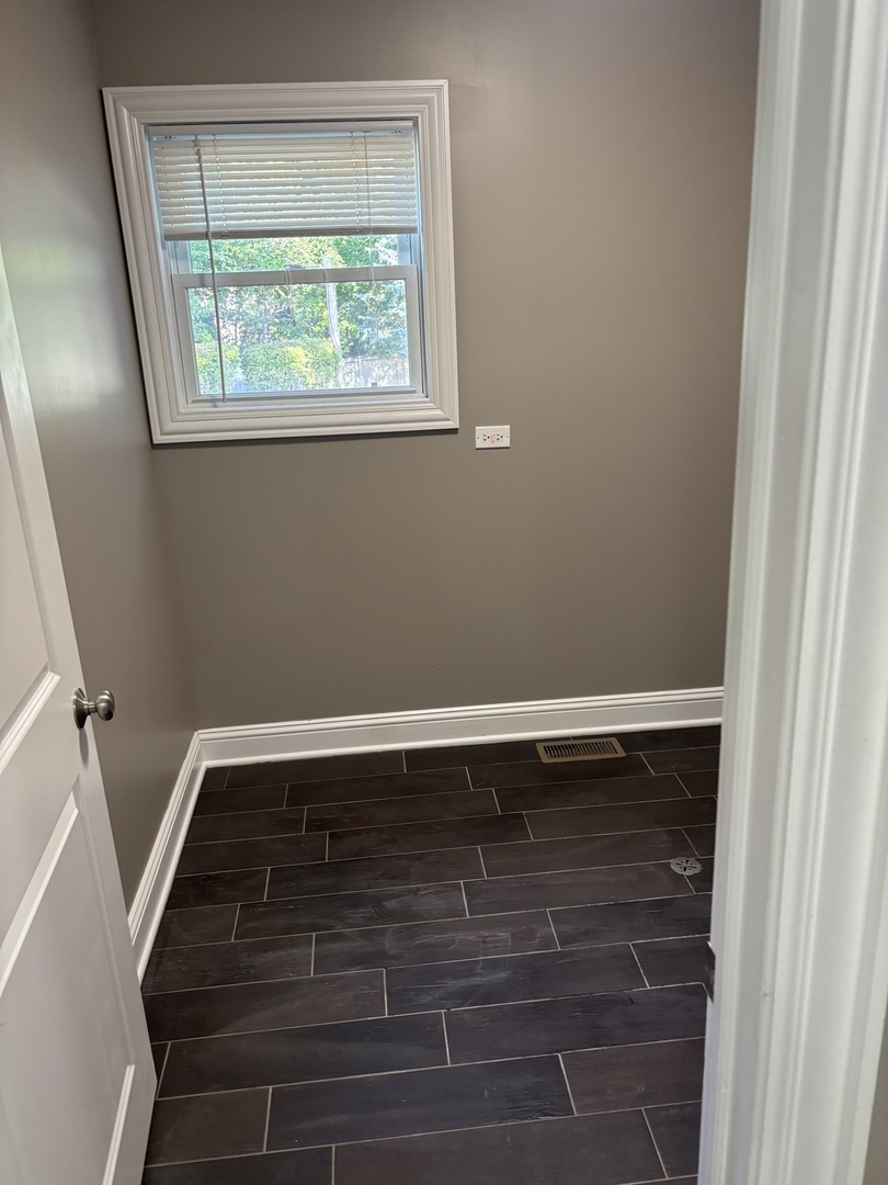 40 Mischa Court, Unit 100 Lake Zurich, IL 60047 - Photo 27 of 36 a view of wooden floor