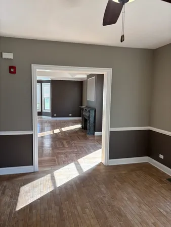 a view of a livingroom with wooden floor
