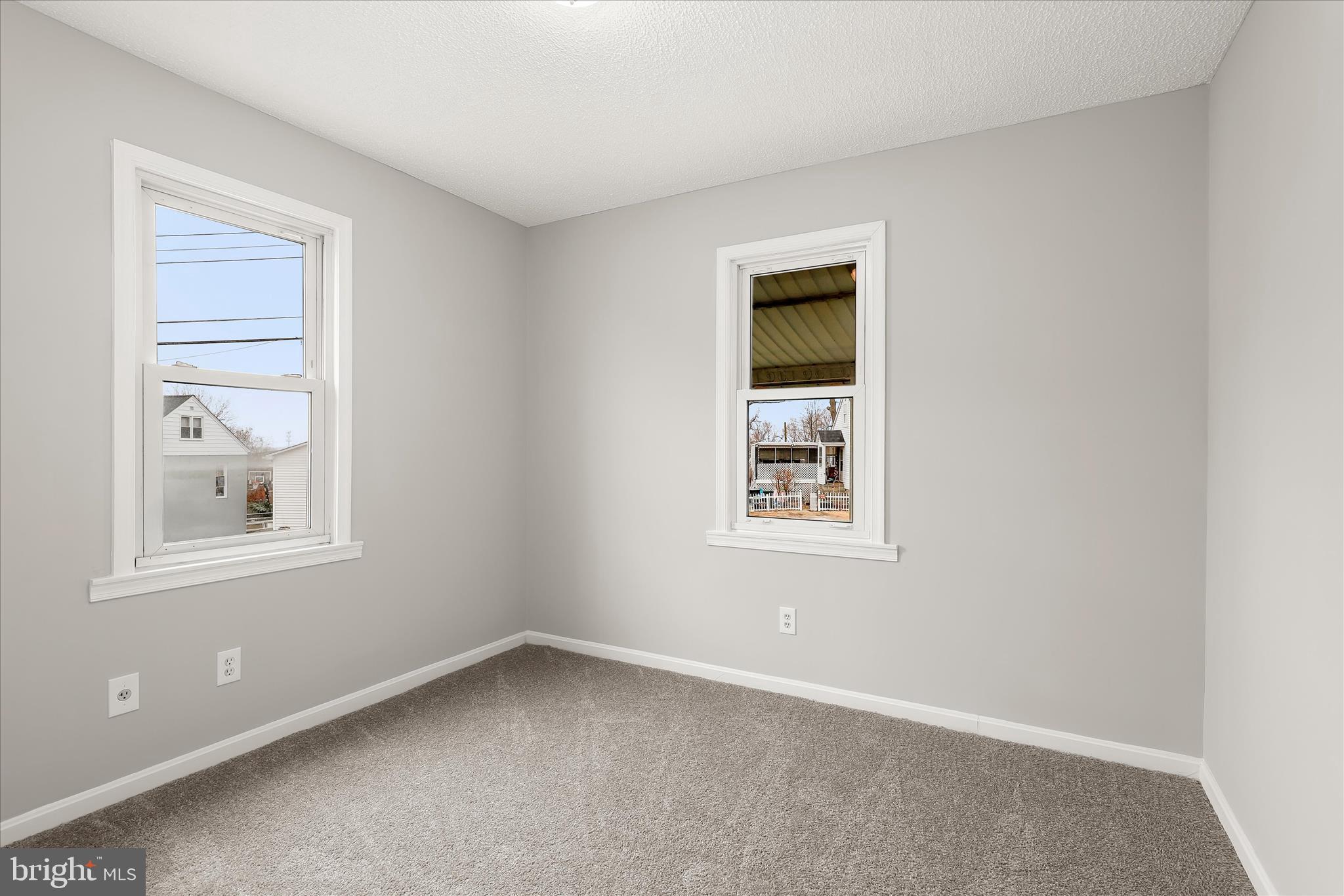 1218 Rustic Avenue Rosedale, MD 21237 - Photo 16 of 34 an empty room with windows