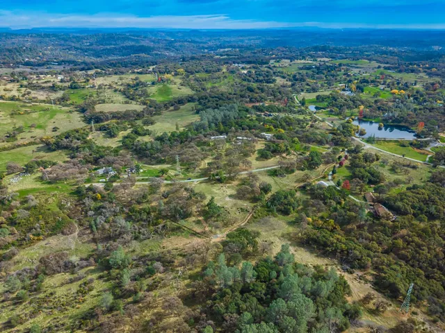 a view of city with ocean