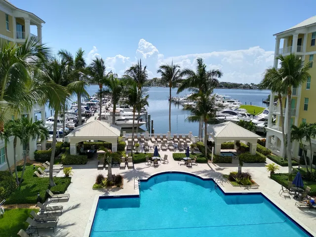 a view of a swimming pool with a patio