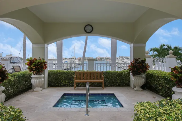 a view of a porch with furniture and a potted plants