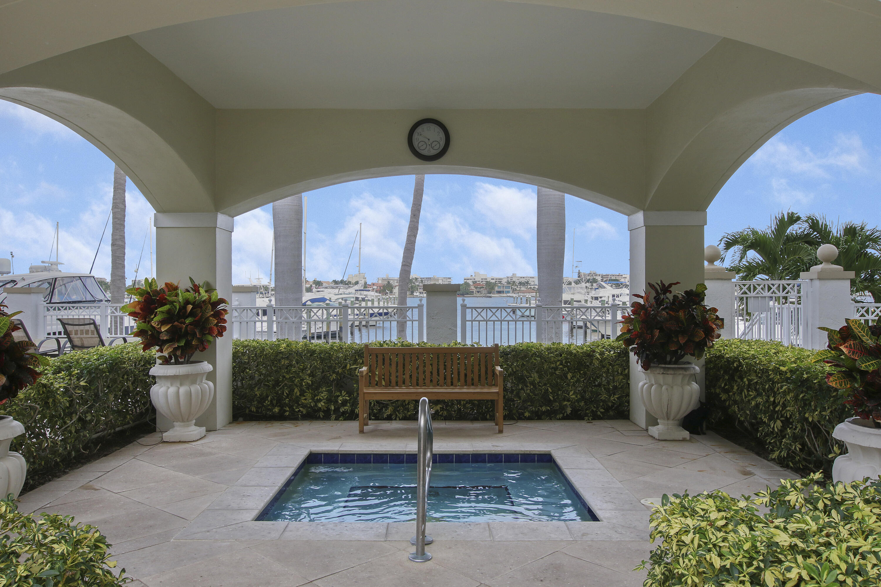 806 East Windward Way, Unit 410 Lantana, FL 33462 - Photo 25 of 33 a view of a porch with furniture and a potted plants