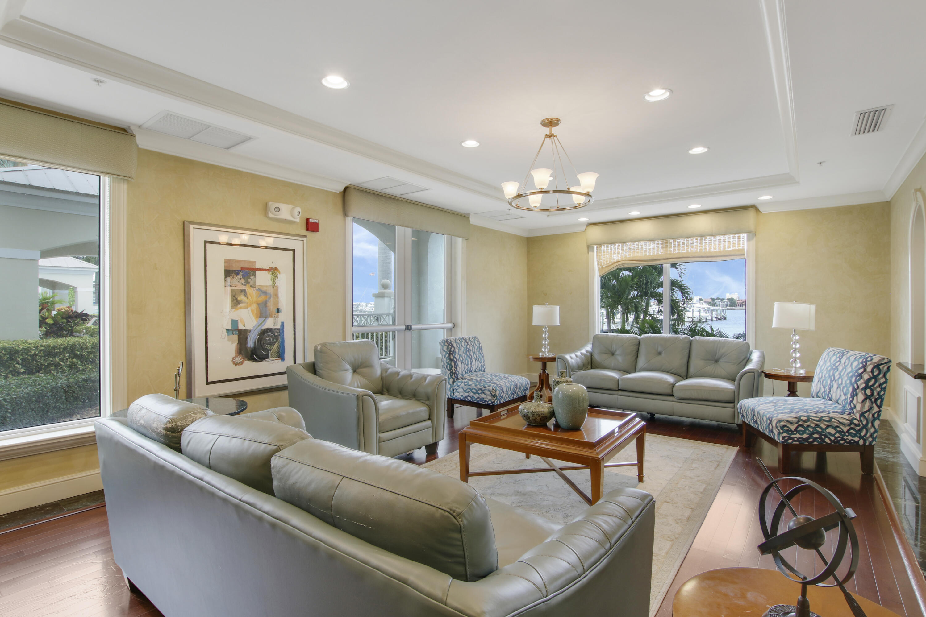 806 East Windward Way, Unit 410 Lantana, FL 33462 - Photo 31 of 33 a living room with furniture and a large window