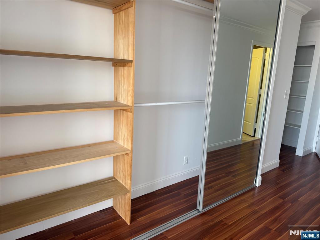 200 Old Palisade Road, Unit 7J Fort Lee, NJ 07024 - Photo 18 of 20 a view of walk in closet with empty room