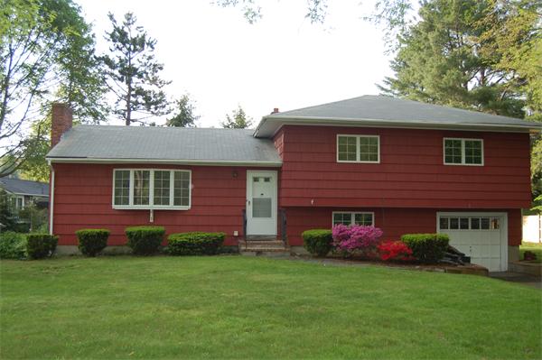 8 Ipswich Road Topsfield, MA 01983 - Photo 2 of 14 a front view of a house with a garden