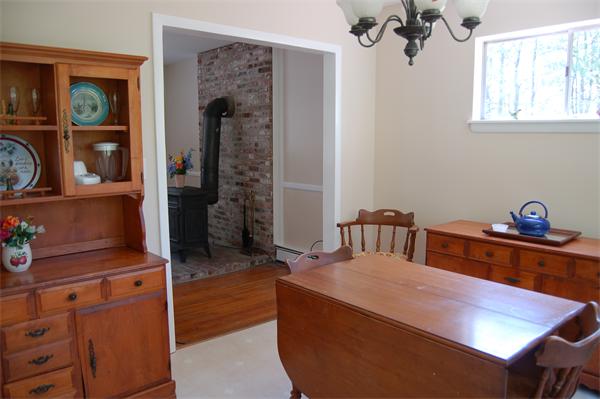 8 Ipswich Road Topsfield, MA 01983 - Photo 9 of 14 a bedroom with a bed and a table
