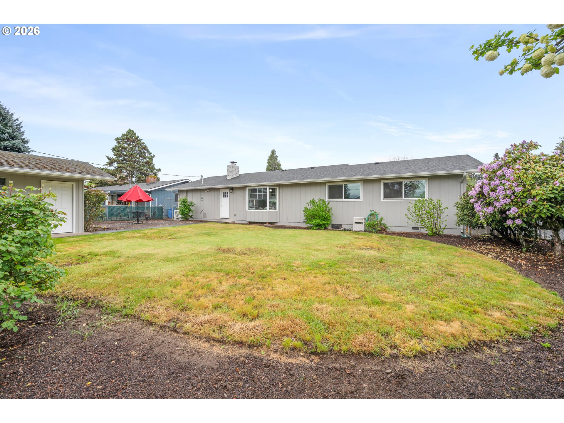 2463 Moore Street Eugene, OR 97404 - Photo 32 of 34 a view of a house with a swimming pool