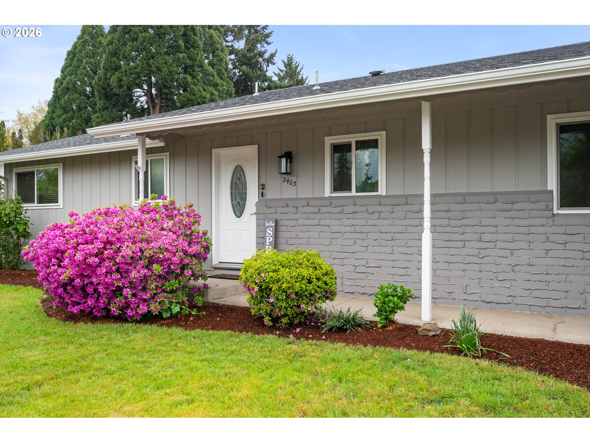 2463 Moore Street Eugene, OR 97404 - Photo 4 of 34 a view of a house with a yard
