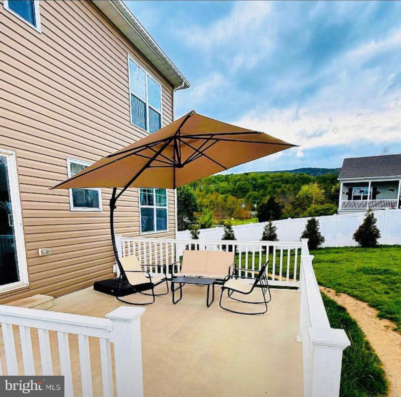 123 Hank Aaron Road Berkeley Springs, WV 25411 - Photo 28 of 32 Charming patio with scenic views.