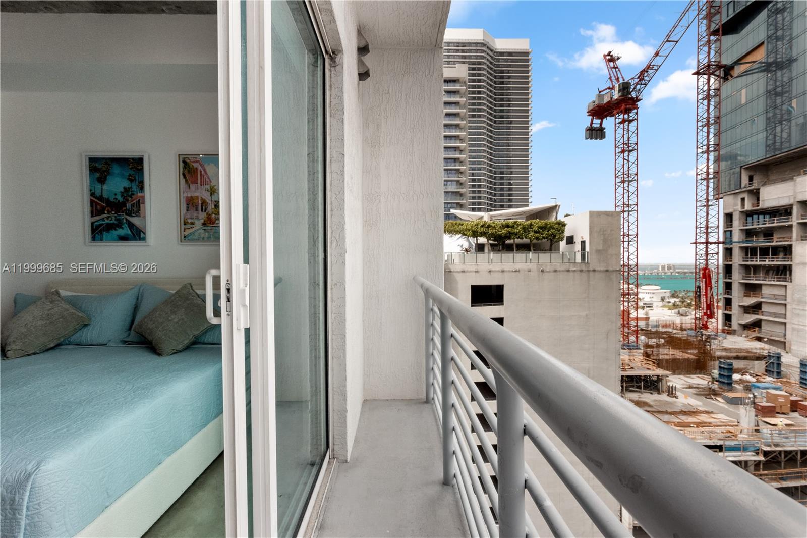 234 Northeast 3rd Street, Unit 1704 Miami, FL 33132 - Photo 32 of 35 a view of a balcony and chairs