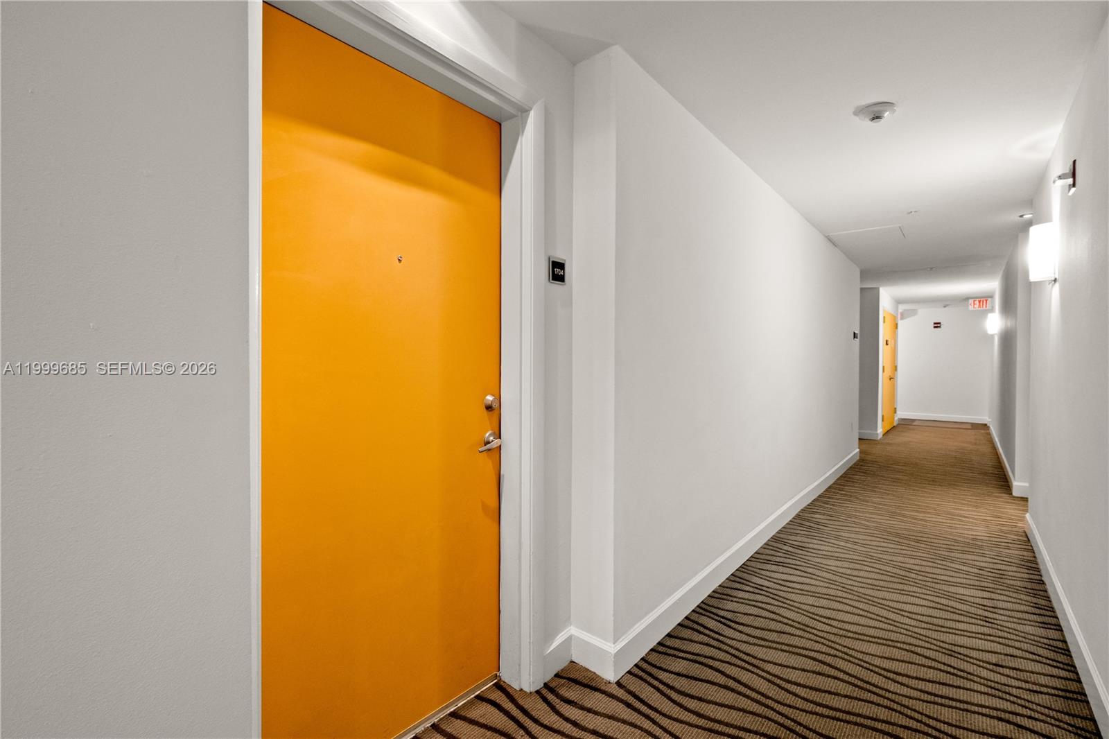 234 Northeast 3rd Street, Unit 1704 Miami, FL 33132 - Photo 33 of 35 a view of hallway with wooden floor