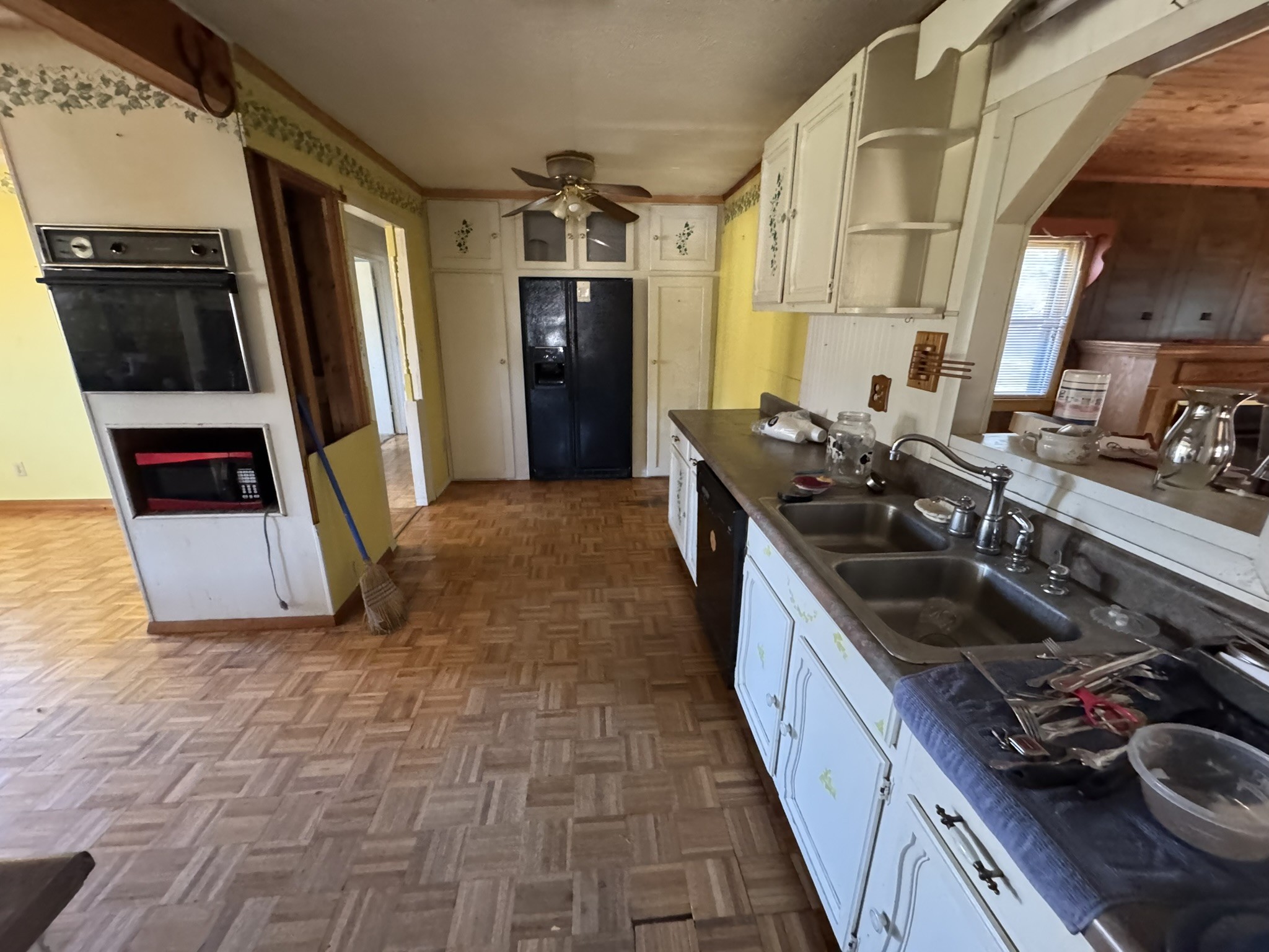 7415 Rock Creek Road Tullahoma, TN 37388 - Photo 14 of 27 a kitchen with sink stove and refrigerator