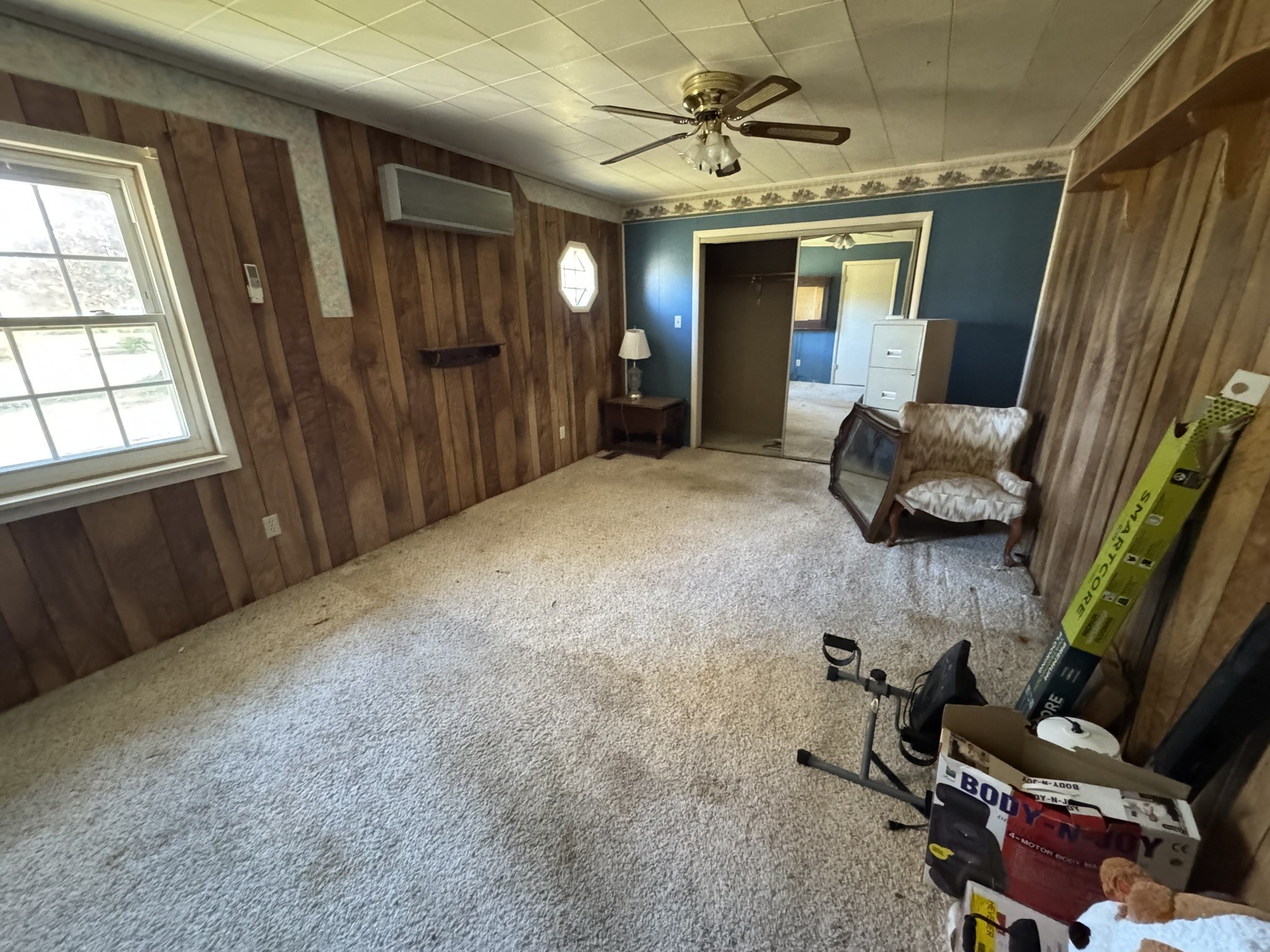 7415 Rock Creek Road Tullahoma, TN 37388 - Photo 17 of 27 a room with window and a couch