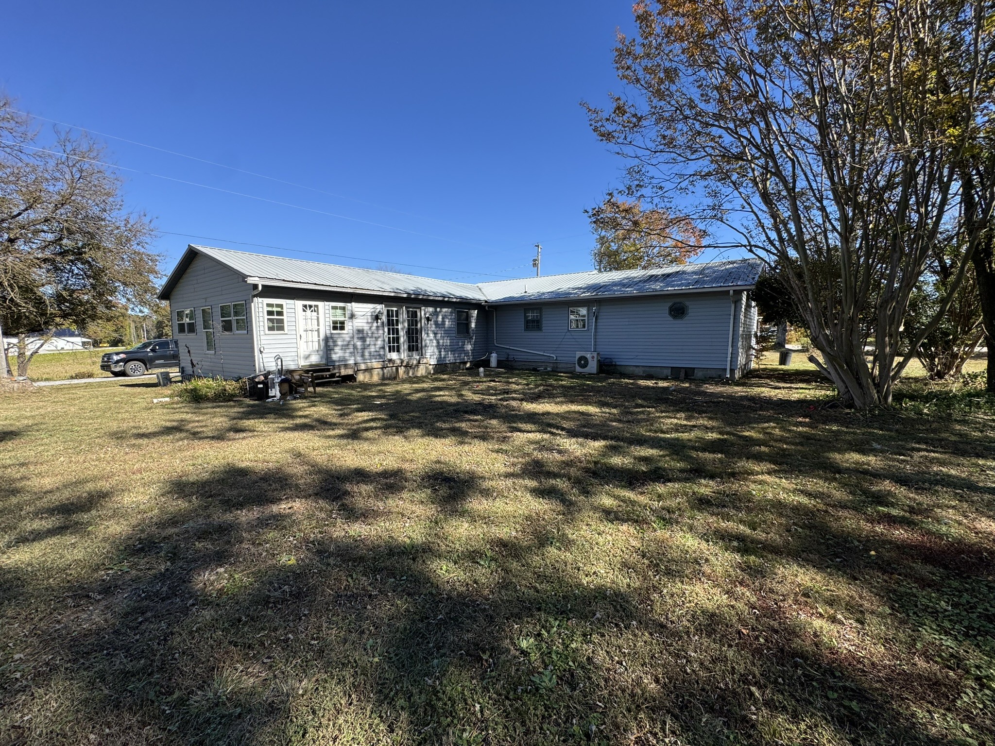 7415 Rock Creek Road Tullahoma, TN 37388 - Photo 7 of 27 a view of a house with a yard