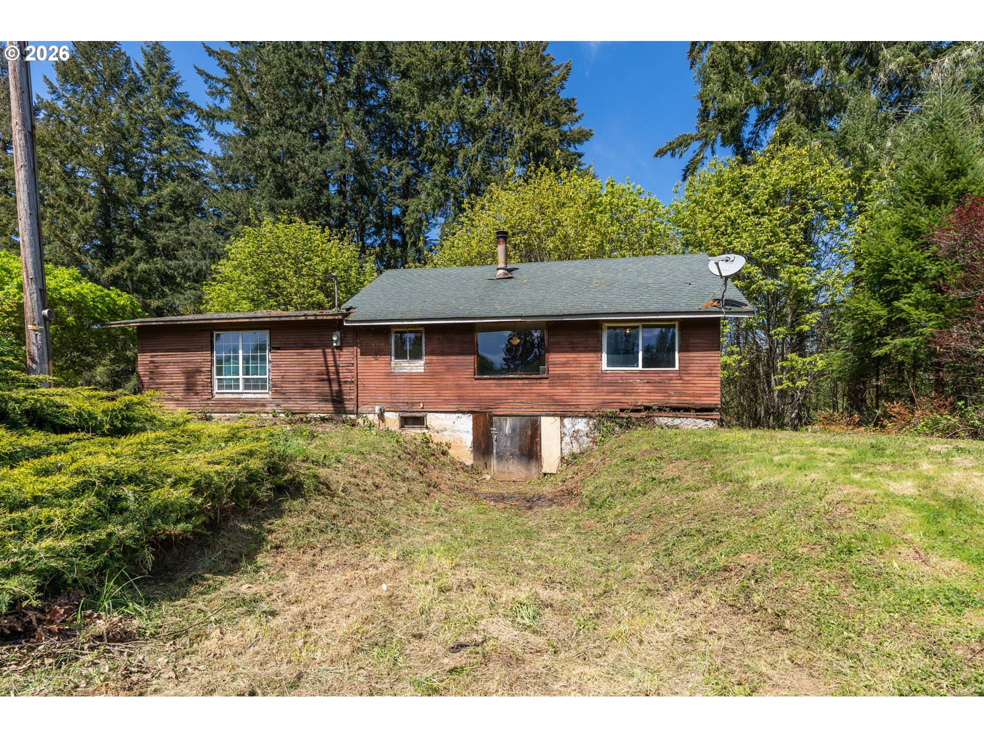 21542 Highway 126 Noti, OR 97461 - Photo 8 of 22 a front view of a house with garden