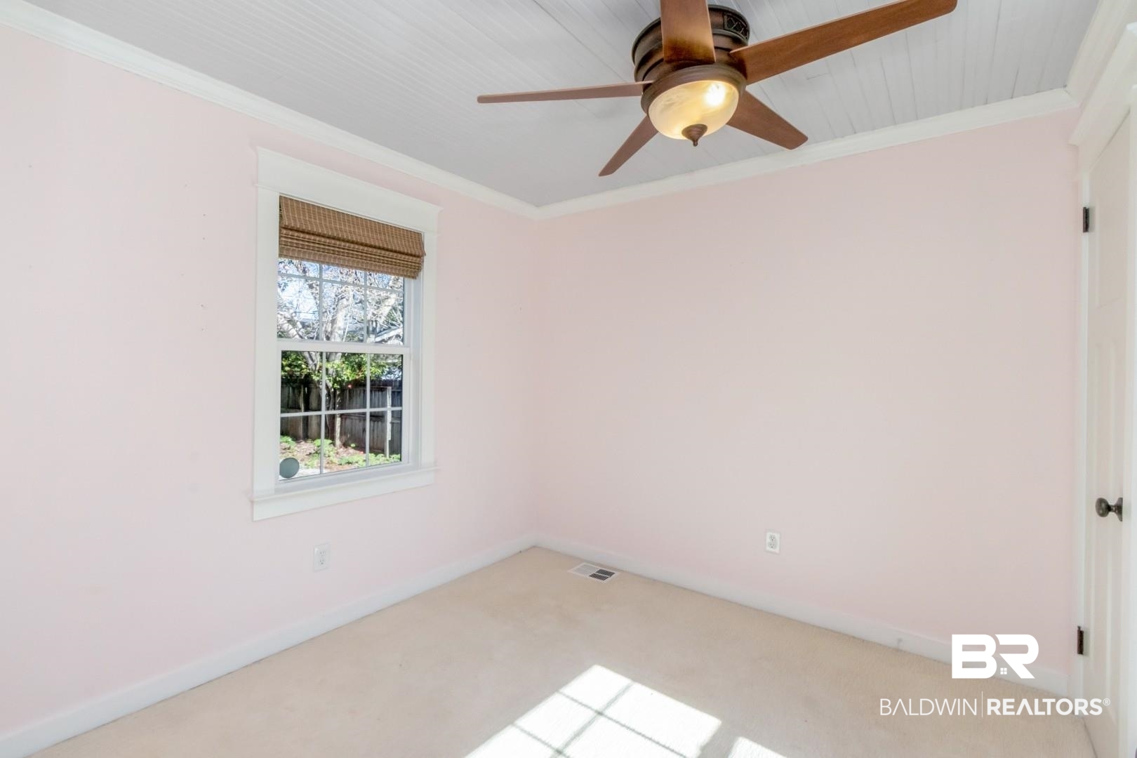 10 South Hathaway Road Mobile, AL 36608 - Photo 20 of 46 Carpeted empty room featuring ornamental molding and a ceiling fan