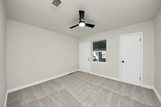 a view of an empty room and window