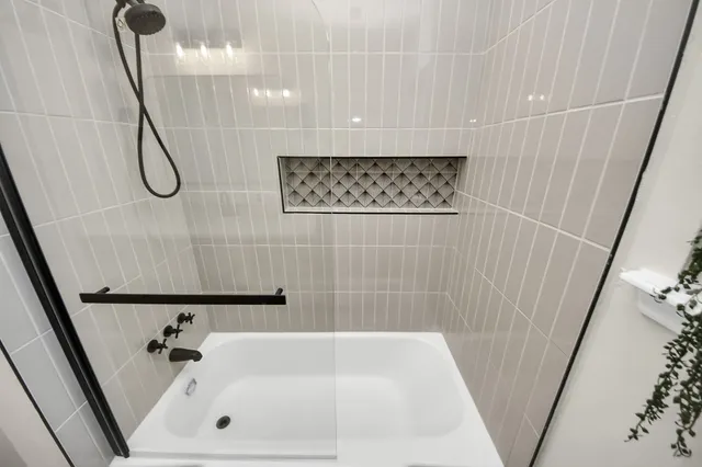 a bathroom with a bathtub