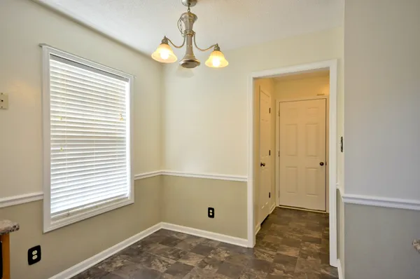 a view of a room with a window
