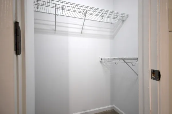 a view of a room with racks on the wall