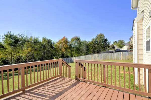 a view of a wooden roof deck
