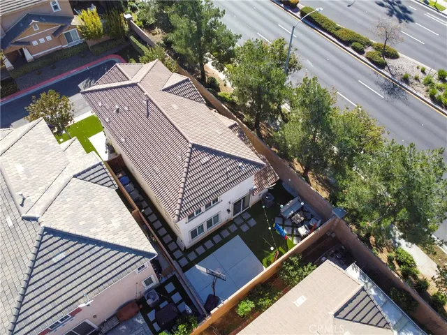 a view of a backyard with sitting area