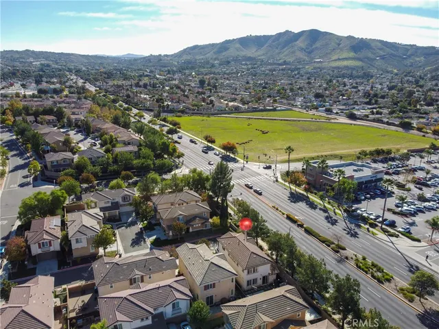 a view of a city with mountains in the background