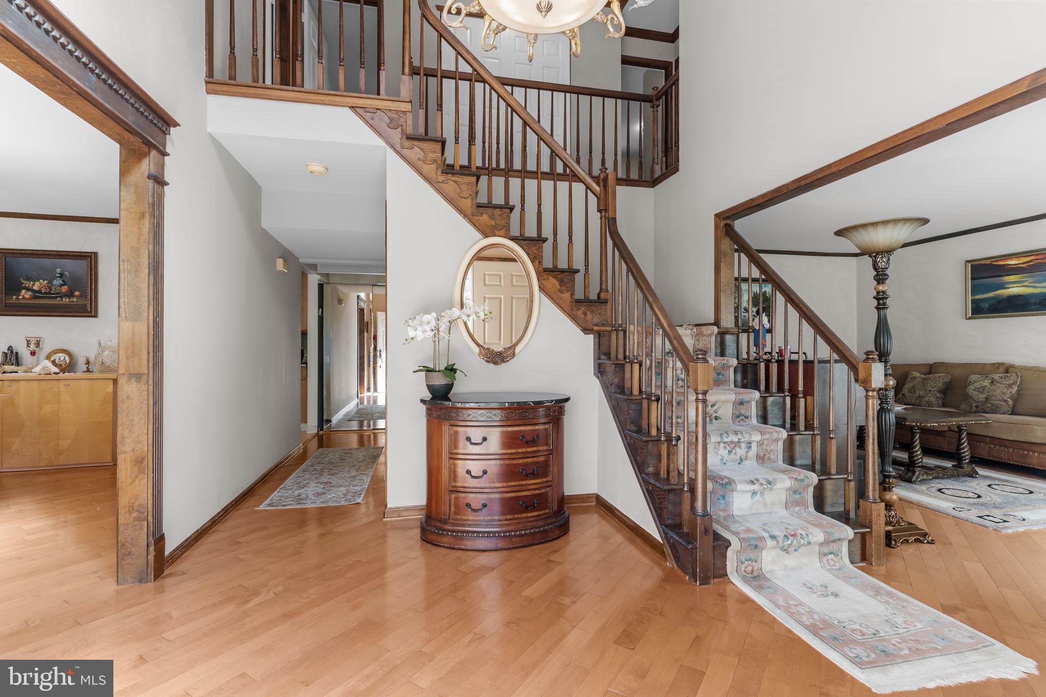 15 Roy Lane Huntingdon Valley, PA 19006 - Photo 5 of 45 a view of entryway and hall with wooden floor