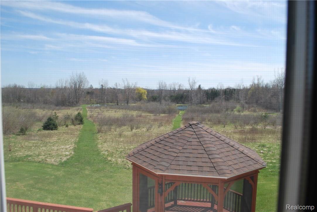 5365 Hollenbeck Road Columbiaville, MI 48421 - Photo 42 of 48 Second Level back view - Copy.JPG