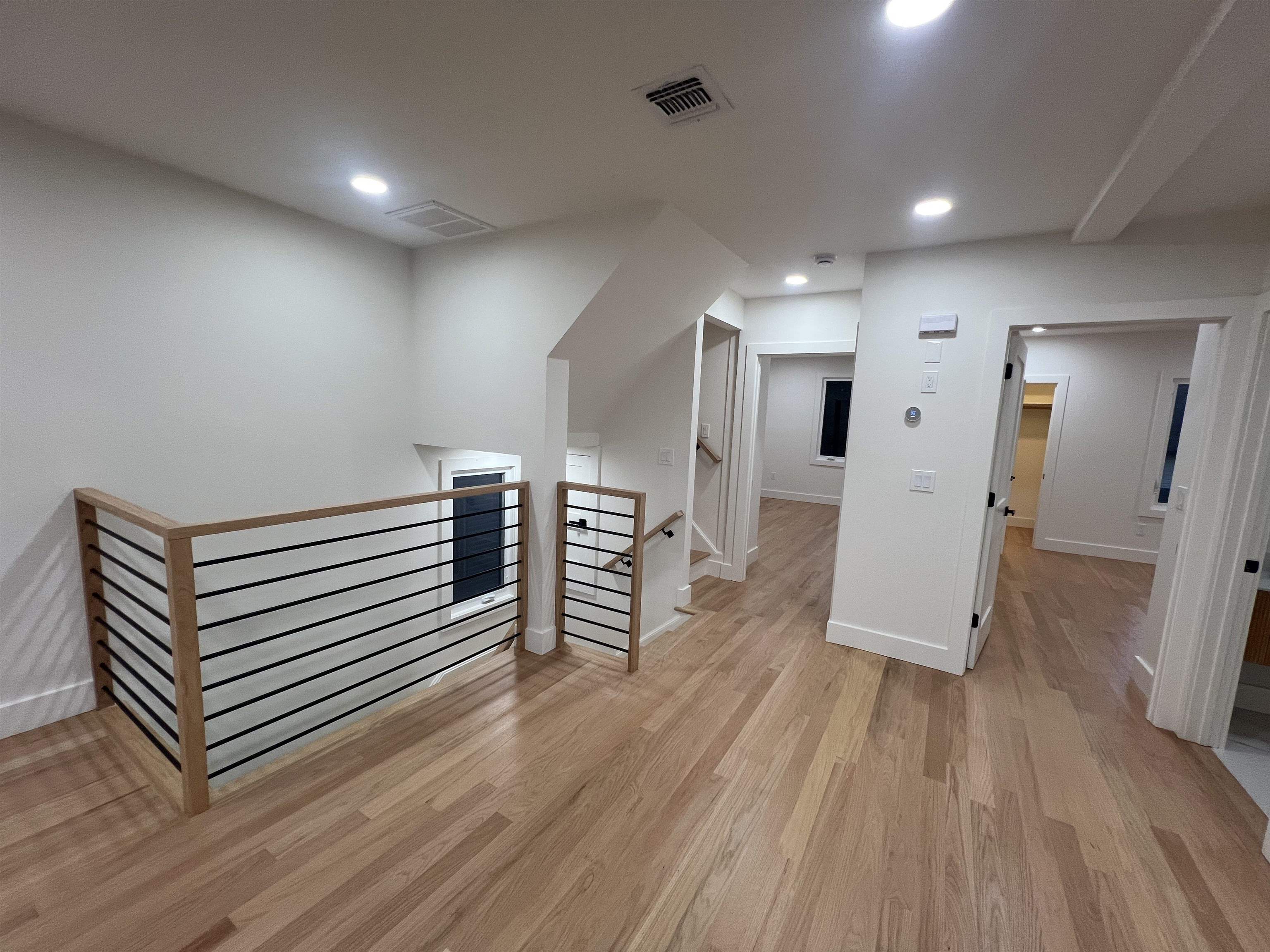 210 Waldo Place, Unit 2 Englewood, NJ 07631 - Photo 11 of 23 a view of a hallway with wooden floor
