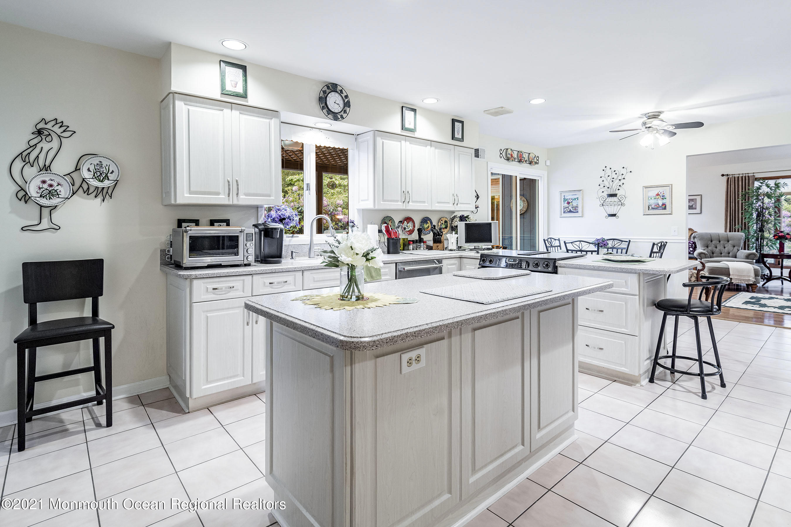 617 Turkey Point Road Brick, NJ 08724 - Photo 2 of 43 a kitchen with a sink a stove cabinets and living room view