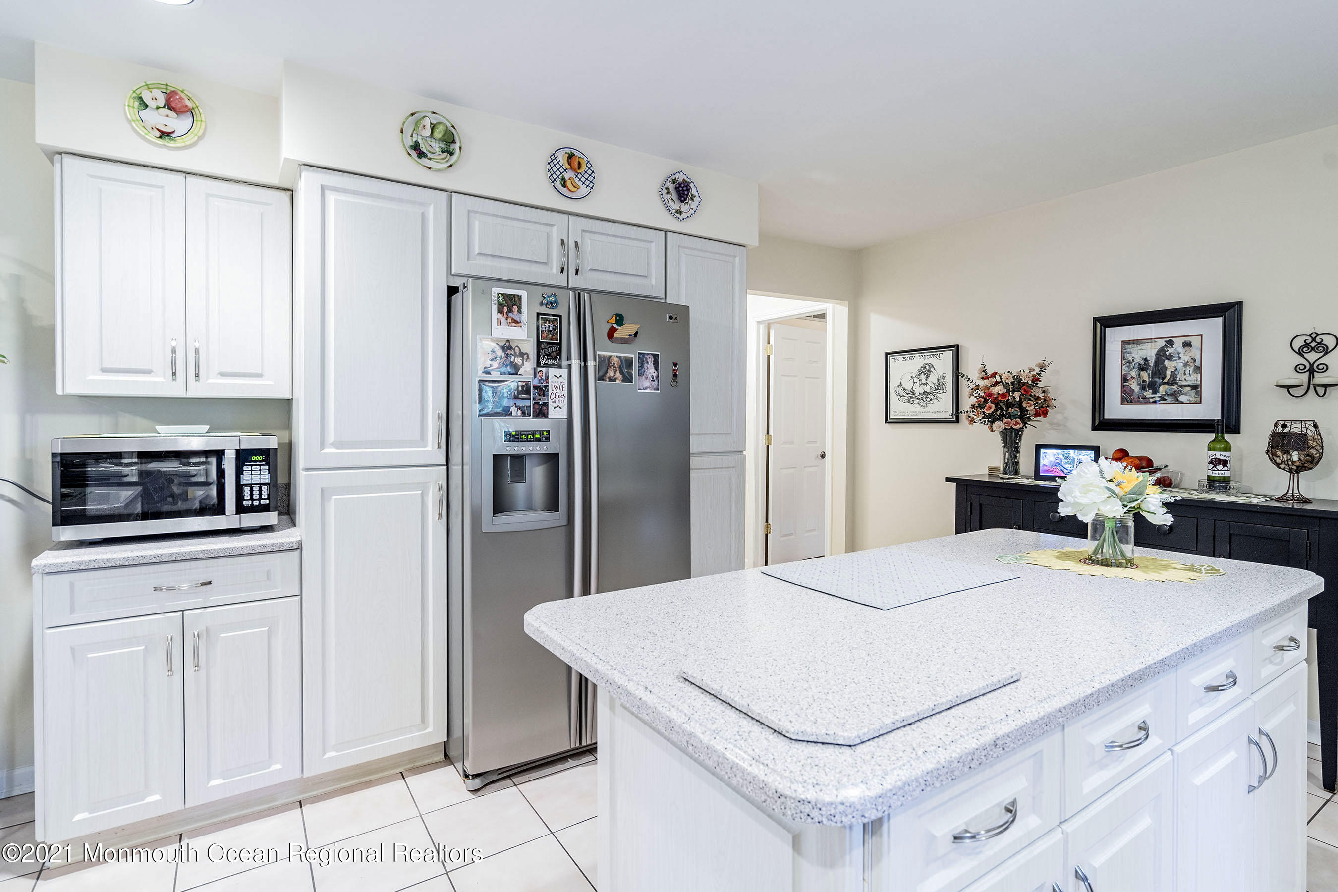 617 Turkey Point Road Brick, NJ 08724 - Photo 11 of 43 a kitchen with stainless steel appliances kitchen island a refrigerator sink and cabinets