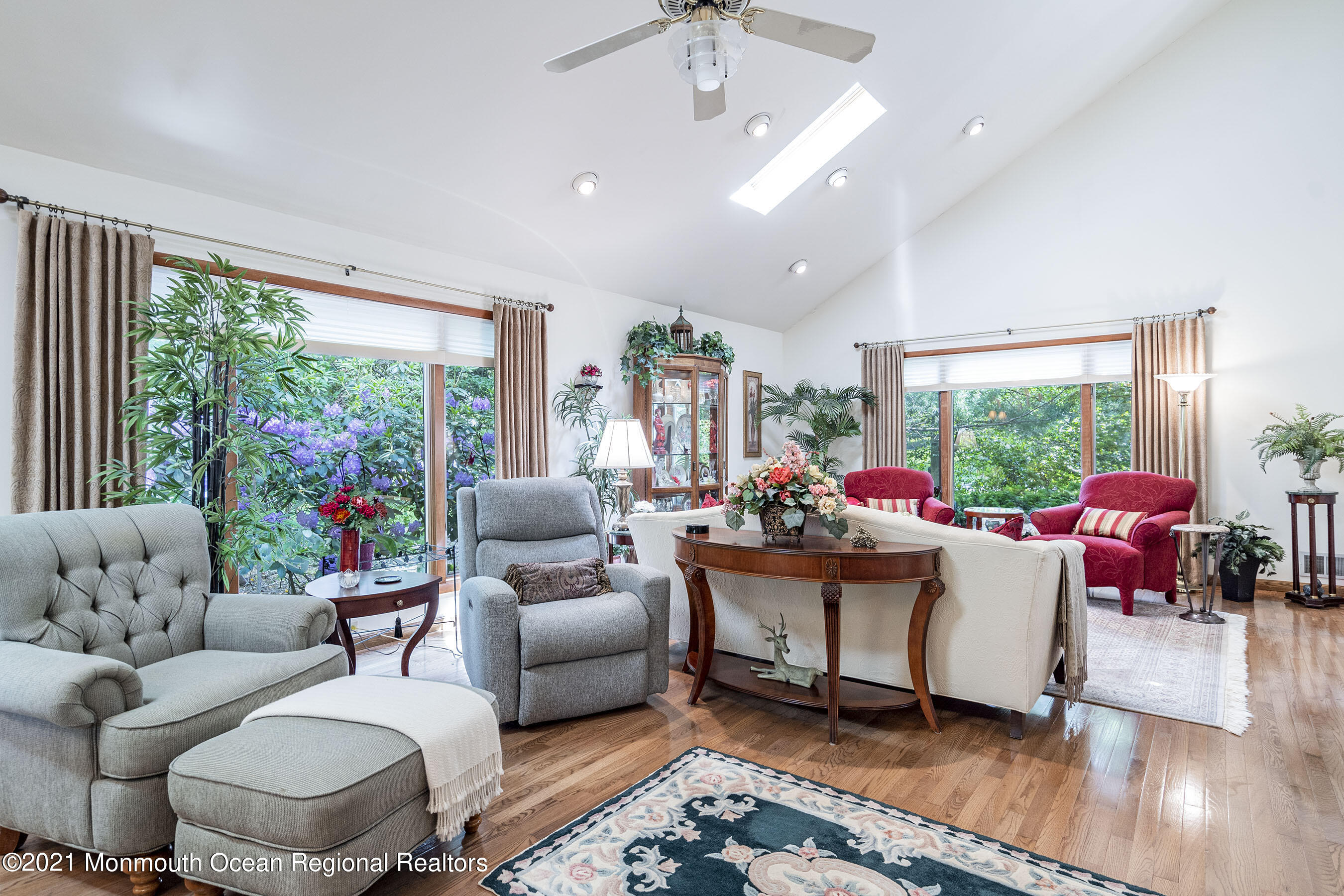 617 Turkey Point Road Brick, NJ 08724 - Photo 18 of 43 a living room with patio furniture and a large window