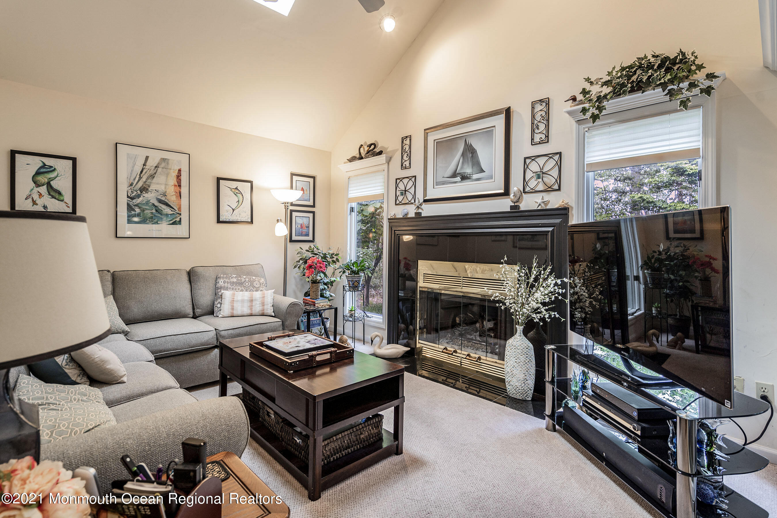 617 Turkey Point Road Brick, NJ 08724 - Photo 20 of 43 a living room with furniture and a fireplace