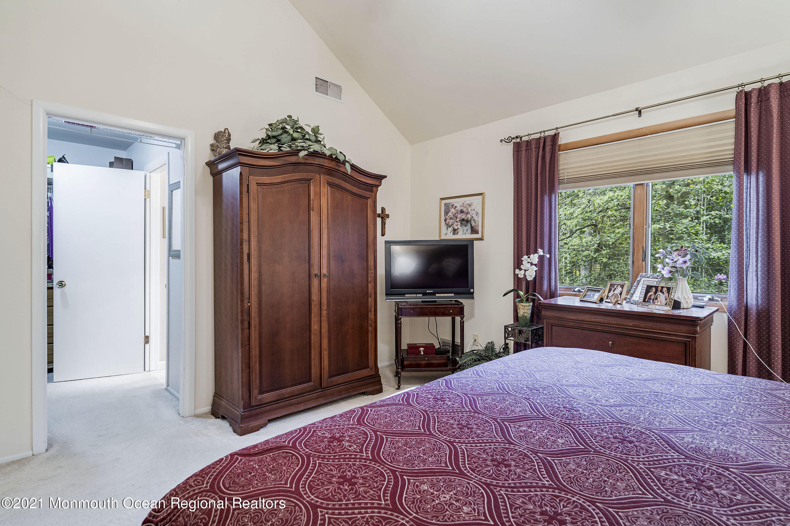 617 Turkey Point Road Brick, NJ 08724 - Photo 26 of 43 a bedroom with a bed and a television