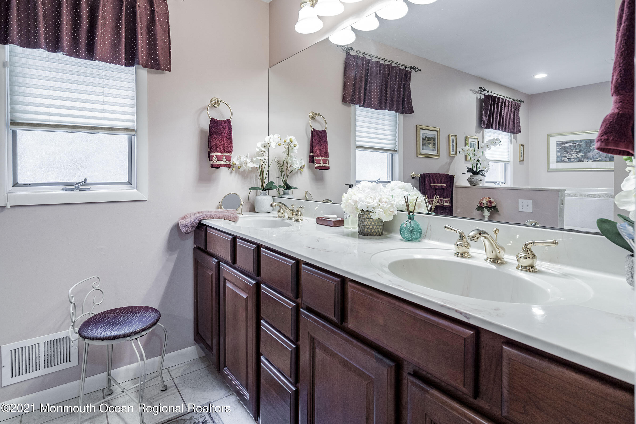 617 Turkey Point Road Brick, NJ 08724 - Photo 28 of 43 a bathroom with a sink a vanity and a mirror