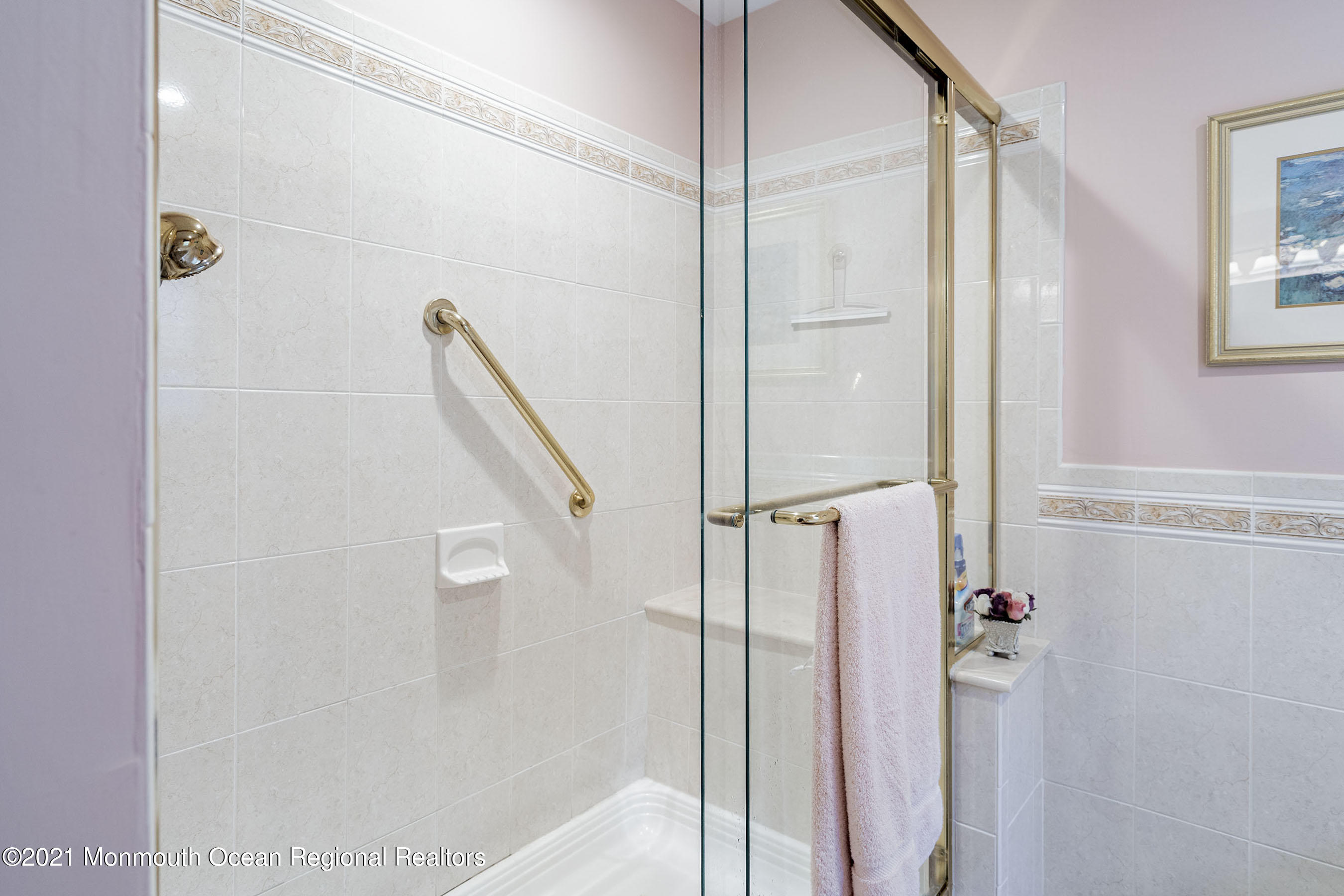 617 Turkey Point Road Brick, NJ 08724 - Photo 29 of 43 a bathroom with a shower and a glass door
