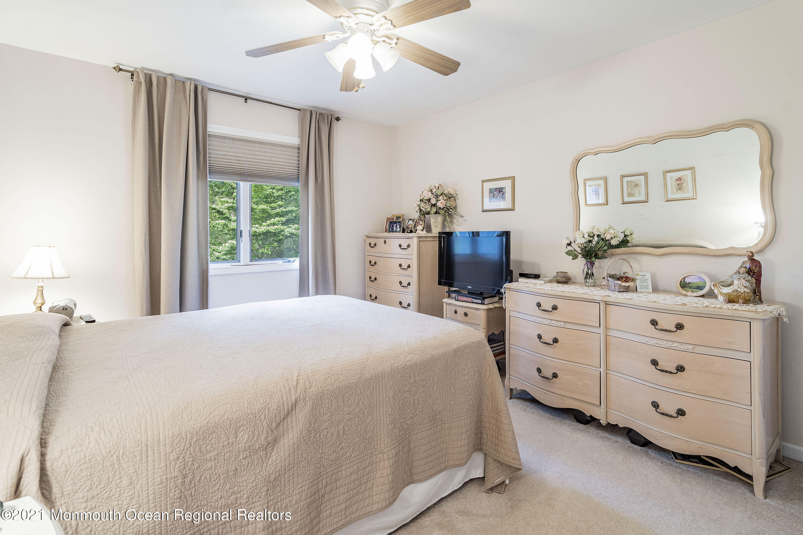 617 Turkey Point Road Brick, NJ 08724 - Photo 30 of 43 a bedroom with a bed and a dresser