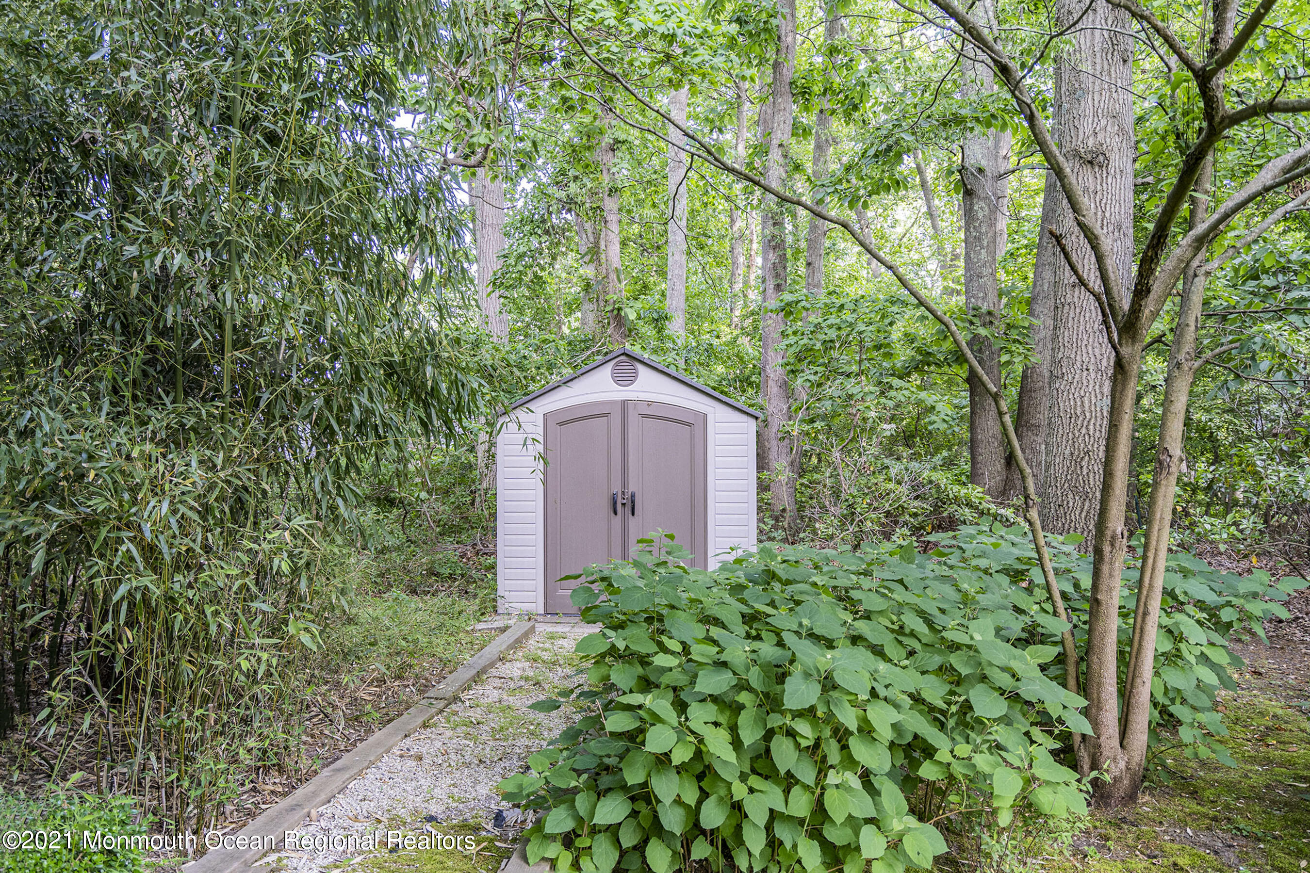 617 Turkey Point Road Brick, NJ 08724 - Photo 38 of 43 a view of a house in a forest